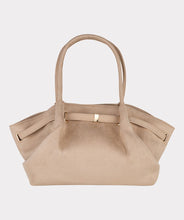 Load image into Gallery viewer, Cappuccino colored suede bag against a white background.
