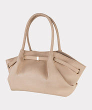 Load image into Gallery viewer, Cappuccino colored suede bag against a white background.
