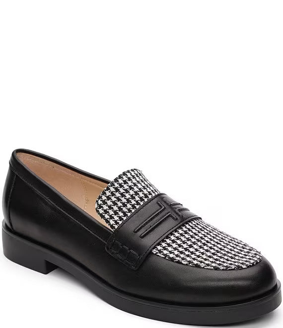 The houndstooth pattern, renowned for its classic black and white hues, lends a touch of elegance and versatility to these slip-on loafers. Ideal for elevating a business ensemble or complementing casual wear, these loafers are a superb addition to any wardrobe.