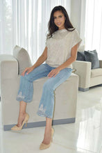 Load image into Gallery viewer, Add a touch of glamour to your wardrobe with this gorgeous denim pant featuring beige floral embroidery and clear rhinestone detailed hems. The Ripley can be dressed up or down, making it a versatile and stylish choice for any occasion. The perfect blend of sparkle and sophistication.
