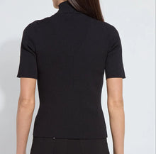 Load image into Gallery viewer, Model wearing black chevron ribbed elbow sleeve top and black pants against a white background.
