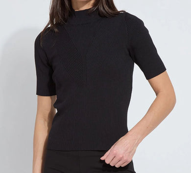Model wearing black chevron ribbed elbow sleeve top and black pants against a white background.