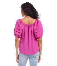Load image into Gallery viewer, Boasting pleated tiers on the sleeves and shirring at the neck, this peasant top in a vibrant berry color, offers a charmingly feminine aesthetic. The puff sleeves elevate the look. A gorgeous top to dress up or wear casually with your favorite jeans. Color- Berry. Scoop neck. Shirttail hem. Puff sleeve. Fabric -100% Polyester.

