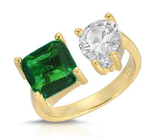 Load image into Gallery viewer, When you wear this stunning adjustable cubic zirconia ring, you will receive compliments.  The one size fits all ring has one clear pear shaped cz and one emerald square cut cz with a gold base. The best of both worlds!  Color - Gold, clear and green. One size and adjustable. One pear shape cz and one square shape cz. 14 kt gold plate over brass.
