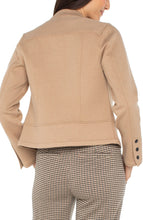 Load image into Gallery viewer, Woman wearing a camel-colored jacket over a black top and plaid pants against a white background.
