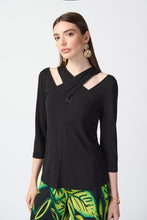 Load image into Gallery viewer, Enhance your daily appearance with this chic top made from bamboo jersey. The unique bamboo fibers create a lightweight and luxuriously soft garment. The fit compliments your physique, while the three-quarter length sleeves and cutout neckline add a refined and classy element.  Color- Black. Cutout neckline. Three-quarter sleeves.
