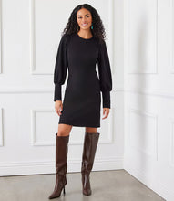 Load image into Gallery viewer, This Bishop Sleeve Dress is made from stretch Ponte fabric, providing a comfortable and flattering fit. The long sleeves feature wide cuffs, adding a touch of sophistication. Perfect for the cooler seasons, this dress combines style and comfort effortlessly.
