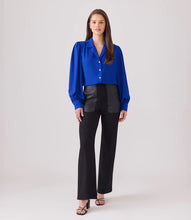 Load image into Gallery viewer, Experience the ultimate combination of style and comfort with the Black Contrast Pocket Pants by Karen Kane. Whether dressing up for the office or aiming for a casual yet chic look, these pants provide a premium feel against your skin. Elevate your next black pant experience with Karen Kane&#39;s signature contrast pocket design.  Color - Black. Contrast pockets in faux leather. Full length. Straight leg. Elasticized waistband.
