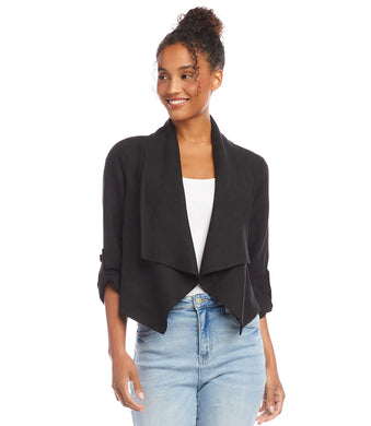 Find the perfect balance between both fashion and comfort with this eco-friendly essential. Its drape collar exudes a sense of effortless sophistication, crafting a flattering silhouette to suit all body types. Color - Black. Draped collar. Roll-up sleeves with button tabs. Smocked back. Hi-low hem.