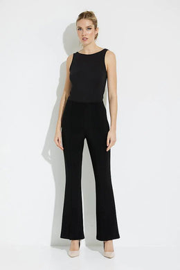 Add a touch of flare with a split front hem and you have the most fashionable pair of black pants that make a sleek, modern statement.  This Joseph Ribkoff high rise flare leg pant has a flattering fit and wider cut, which lengthens your leg for a truly polished look.  Color- Black. Elastic waist. High rise. Flattering fit. Long flared leg.