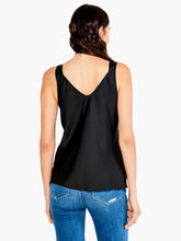 Load image into Gallery viewer, Introducing our latest must-have: the lace camisole. Its design is sleek, its structure impeccable, and its material ultra-soft. It is thoughtfully designed with convenient, bra-friendly straps to simplify your routine. The delicate, feminine lace trim at the v-neckline makes it perfect for layering under any outfit. It&#39;s the subtle touch of lace that enhances every ensemble, making it our go-to piece under sweaters, cardigans, and jackets this season.
