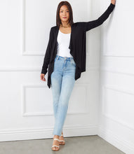 Load image into Gallery viewer, Wrap yourself in the cozy embrace of this cardigan, designed to be your go-to piece for both casual chic and laid-back elegance. The versatile open-front design provides a stylish layering solution perfect for those unpredictable weather days.
