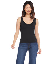 Load image into Gallery viewer, Indulge in the buttery softness of this essential tank. With its flattering scoop neck and super soft fabrication, this easy basic is a must-have staple. This tank is the perfect base for all your layering needs.  Color- Black. Sleeveless. Scoop neckline. Fitted. Fabric -92% Nylon. 8% Spandex.
