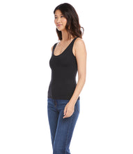 Load image into Gallery viewer, Indulge in the buttery softness of this essential tank. With its flattering scoop neck and super soft fabrication, this easy basic is a must-have staple. This tank is the perfect base for all your layering needs.  Color- Black. Sleeveless. Scoop neckline. Fitted. Fabric -92% Nylon. 8% Spandex.
