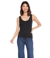 Load image into Gallery viewer, Indulge in the buttery softness of this essential tank. With its flattering scoop neck and super soft fabrication, this easy basic is a must-have staple. This tank is the perfect base for all your layering needs.  Color- Black. Sleeveless. Scoop neckline. Fitted. Fabric -92% Nylon. 8% Spandex.
