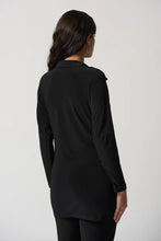 Load image into Gallery viewer, This exquisite tunic is crafted from a luxuriously silky knit fabric, complete with a shirt collar and a sash at the hips that creates a flattering fit and flare silhouette. An ideal addition to any wardrobe, this stunning piece pairs perfectly with pants or jeans.  Color- Black. Shirt collar. Sash at the hips. Button down. Unlined.
