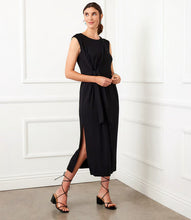 Load image into Gallery viewer, Ideal for attending a brunch date, an outdoor event, or just relaxing and enjoying a leisurely day, this midi dress with a tie waist easily goes from casual to sophisticated. The lightweight rayon fabric guarantees comfortable wear throughout the day, and the addition of spandex provides a touch of flexibility for effortless movement.
