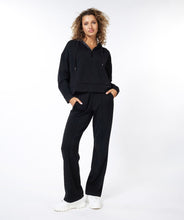 Load image into Gallery viewer, Crafted with high-quality modal material, EsQualo&#39;s Black Modal Flair Trousers offer exceptional comfort and a fashionable silhouette. With its flared legs, the trousers provide a dynamic and chic look. Plus, this piece promises lasting comfort throughout the day. A perfect style to wear casually or dress up.   Color- Black. Pull-on. Perfect stretch. Seams on front legs. Elastic waistband.
