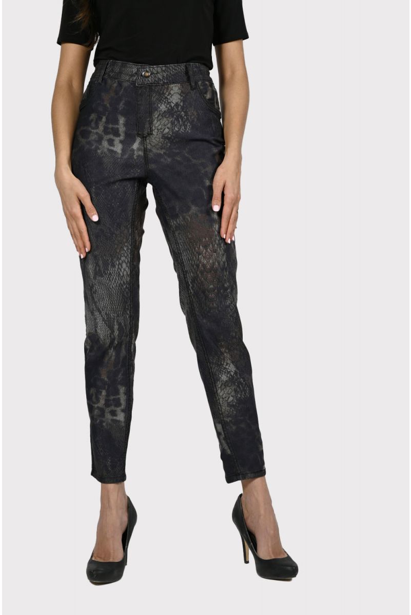 Experience maximum outfit versatility in these innovative two-in-one jeans. The reversible design features a classic animal print on one side and a solid black print on the reverse.  This fabulous denim pant is sure to become a wardrobe favorite! Color - Camel and black. Reversible design. Animal print on one side, solid black on the other. Fly front with belt loops. Perfect stretch and recovery. Fabric - 65% cotton. 33% polyester. 2% elastane. Hand wash cold water inside out. Hang to dry.