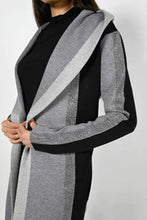 Load image into Gallery viewer, Look sharp in the Frank Lyman cardigan in black/grey striping. Crafted from a high-end fabric, this cardigan features beautiful sequin embellishment, slash pockets, and a stylish hoodie - a perfect addition to your wardrobe for any occasion.  Color- Grey and black. Side functional pockets. Hood. Fabric- 50% Rayon. 28% Polyester. 22% Nylon.
