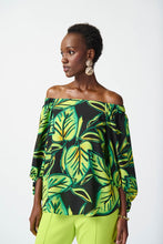 Load image into Gallery viewer, This captivating leaf print top features three-quarter off-the-shoulder puff sleeves that exude glamour and sophistication. The lightweight georgette fabric gives it an ethereal charm, while its flattering silhouette exudes nothing but elegance.
