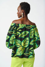 Load image into Gallery viewer, This captivating leaf print top features three-quarter off-the-shoulder puff sleeves that exude glamour and sophistication. The lightweight georgette fabric gives it an ethereal charm, while its flattering silhouette exudes nothing but elegance.
