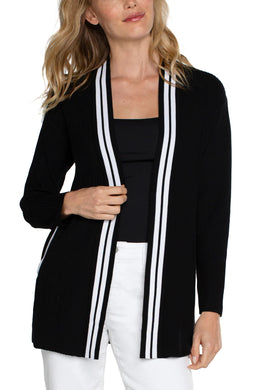 This black open front cardigan boasts a luxurious softness and a refined contrasting white trim. For a polished ensemble, pair it with a classic tee or complement it with the matching Sherese Sleeveless V-Neck Sweater featuring a coordinating contrast trim.  Color-Black and white. Open Front. Long sleeve. Contrasting trim. 12 Gauge Rib.