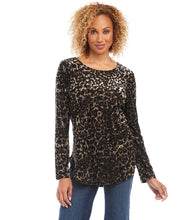 Load image into Gallery viewer, Velvet burnout in a charming leopard design lend both visual and textural interest to this knit top. It&#39;s finished with a stylish shirttail hem. With a touch of shimmer, this soft top is an easy way to dress up any look.  Color- Black with brown. Long sleeve. Crew neck. Unique dye treatment used; color &amp; design may vary. Fabric - Animal Velvet Burnout: 50% Polyester, 40% Nylon, 10% Spandex. Care-Hand wash cold. Do not bleach. Lay flat to dry. Dry clean if desired.

