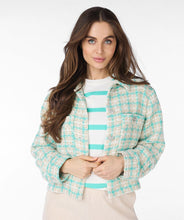 Load image into Gallery viewer, Our Bergette is a darling blazer featuring a blue and off-white plaid pattern with subtle gold detailing. Adorned with sparkling crystal buttons, this blazer is perfect for dressing up or down. The shorter design adds versatility, allowing it to be paired with a skirt or jeans.
