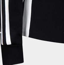 Load image into Gallery viewer, Close-up photo of sporty white stripes on sleeve of the black blazer.

