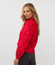 Load image into Gallery viewer, Featuring a raised floral pattern and a bold red hue, the Brandee Blouse 2tone Flower Jacquard by EsQualo is a must-have for those looking to make a statement. The thicker fabric is perfect for colder days, and can easily be dressed up with a skirt, trousers, or even your favorite denim. Don&#39;t miss out on leaving a lasting impression with this chic and unforgettable blouse.
