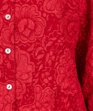 Load image into Gallery viewer, Featuring a raised floral pattern and a bold red hue, the Brandee Blouse 2tone Flower Jacquard by EsQualo is a must-have for those looking to make a statement. The thicker fabric is perfect for colder days, and can easily be dressed up with a skirt, trousers, or even your favorite denim. Don&#39;t miss out on leaving a lasting impression with this chic and unforgettable blouse.
