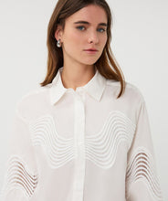 Load image into Gallery viewer, Woman wearing an off-white blouse with lace detailing against a plain background.
