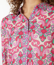 Load image into Gallery viewer, Our Macy multi print blouse is a lovely combination of jade green and pink abstract floral patterns. Lovely and unique, you will stand out in a crowd when you wear this beauty.  Easily pairs with denim and skirts and can be dressed up or worn casually.  Style with our FALLON FLAIR JEAN IN JADE COLOR- ESQUALO for the perfect colorful look!  Colors- Pinks and jade green. Button down. Abstract floral print. Lightweight, slightly sheer. Fabric-100% Viscose.
