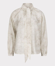Load image into Gallery viewer, Off-white color blouse with tie detail against a white background. 
