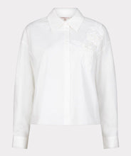 Load image into Gallery viewer, White shirt with floral embroidery against a white background.
