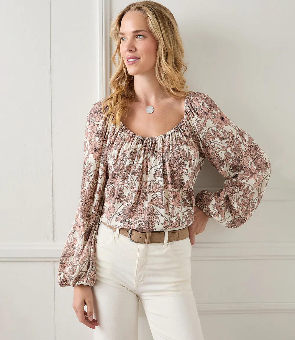 Bohemian style is enhanced in this crepe top, adorned with a stencil floral pattern. Voluminous blouson sleeves complete the look. Color- Pink and cream. Scoop neck. Floral print. 100% Viscose Fabric-100% Viscose. Care- Dry clean.