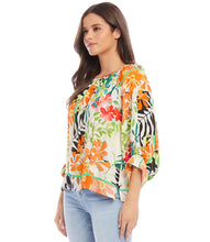 Load image into Gallery viewer, Experience the enchanting and whimsical feel of a floral garden with the Paiden Print Blouson Sleeve Top by Karen Kane. This expertly crafted top boasts a graceful crepe fabric that provides both comfort and style. The relaxed and laid-back attitude is enhanced by the blouson sleeves, making it a must-have addition to any wardrobe.
