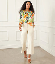 Load image into Gallery viewer, Experience the enchanting and whimsical feel of a floral garden with the Paiden Print Blouson Sleeve Top by Karen Kane. This expertly crafted top boasts a graceful crepe fabric that provides both comfort and style. The relaxed and laid-back attitude is enhanced by the blouson sleeves, making it a must-have addition to any wardrobe.
