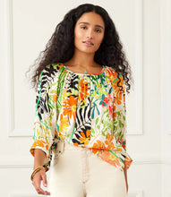 Load image into Gallery viewer, Experience the enchanting and whimsical feel of a floral garden with the Paiden Print Blouson Sleeve Top by Karen Kane. This expertly crafted top boasts a graceful crepe fabric that provides both comfort and style. The relaxed and laid-back attitude is enhanced by the blouson sleeves, making it a must-have addition to any wardrobe.
