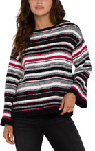 Load image into Gallery viewer, This stylish sweater seamlessly blends timeless elegance with modern flair, featuring a boat neckline that highlights the collarbone and elongates the neck. The captivating striped design and subtle hints of Ruby add a touch of refinement, making it perfect for both casual outings and refined occasions.
