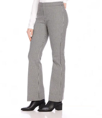 The Karen Kane Bootcut Pants in black and off-white are expertly crafted from a long-lasting woven material, making them ideal for both work and evening wear. Sporting a chic small check pattern, these pants are a practical and versatile choice for colder weather.