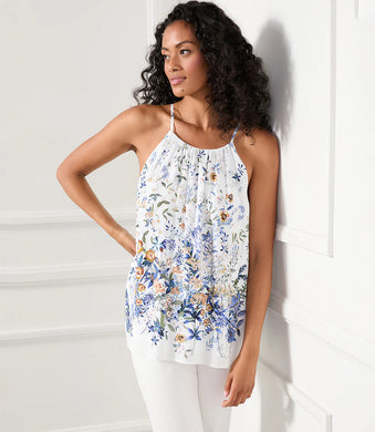 Dainty, pretty spring and summer flowers stand out on this billowy top cut from fluid crepe fabrication. Gorgeous enough to wear on its own, or under a jacket, this multi-use tank is a beauty that can be dressed up or worn casually. Color - White with blues and yellow. Sleeveless. Scoop neck. Floral print.