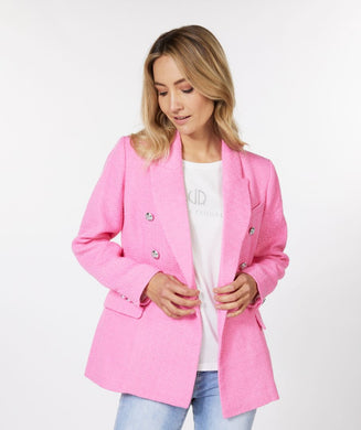 This amazing boucle blazer in pink is absolutely stunning in person.  Sophisticated and charming, our Pandora blazer is a Chanel inspired design with decorative buttons that provide a rich look.  Dress up or wear with denim, this blazer will elevate any look.