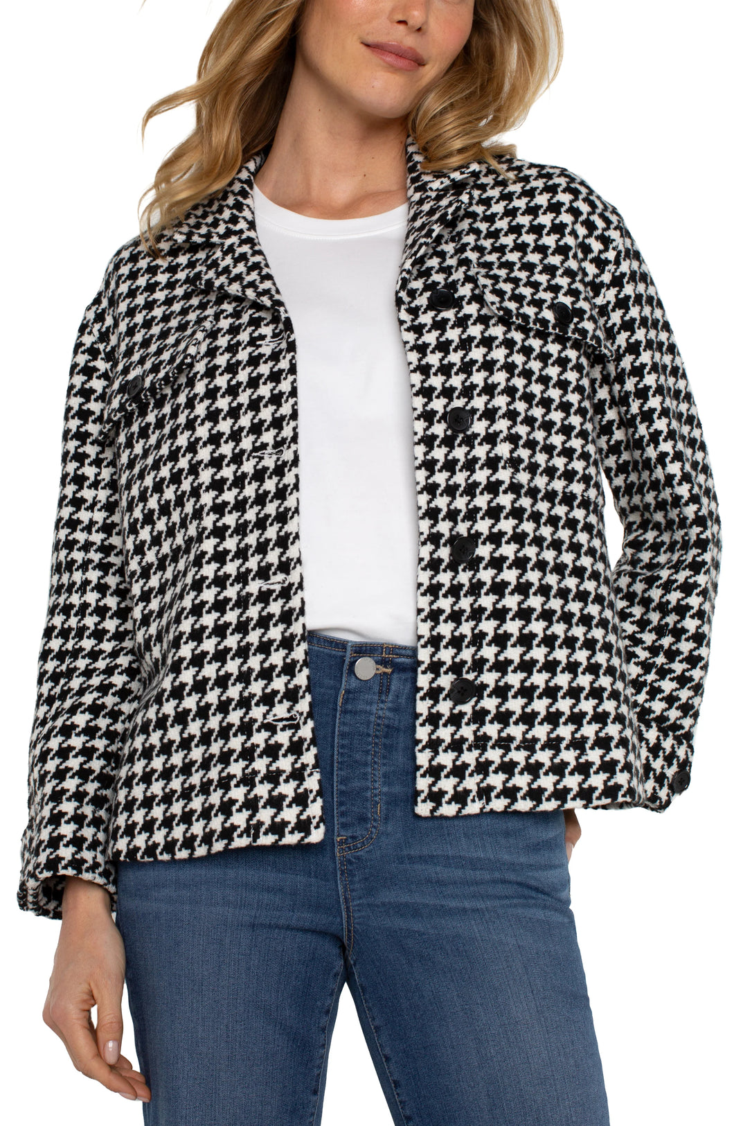 Enhance your everyday attire with this chic boxy shacket. Featuring a timeless black and white houndstooth design, this Liverpool Los Angeles jacket is a standout piece. It pairs seamlessly with black trousers for a professional look or denim for casual outings, making it an essential addition to your wardrobe.