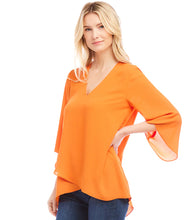 Load image into Gallery viewer, Floaty layers bring soft movement to a silky crepe blouse that can be worn for work or the weekend. The V-neck design adds a touch of femininity, while the 3/4 bracelet sleeves and eye-catching asymmetric crossover hem add a contemporary edge to a classic style.
