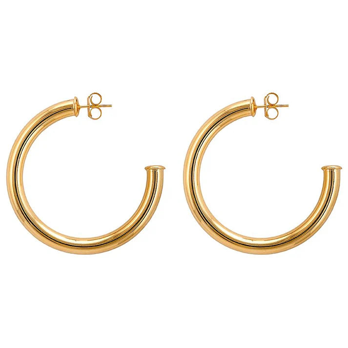 Crafted in Brazil, these smaller version Arlene Hoops are a spin-off of our top-selling design. Consider it the younger sibling – compact in size, but no less elegant. If you enjoy hoops that make a statement, these earrings are for you!