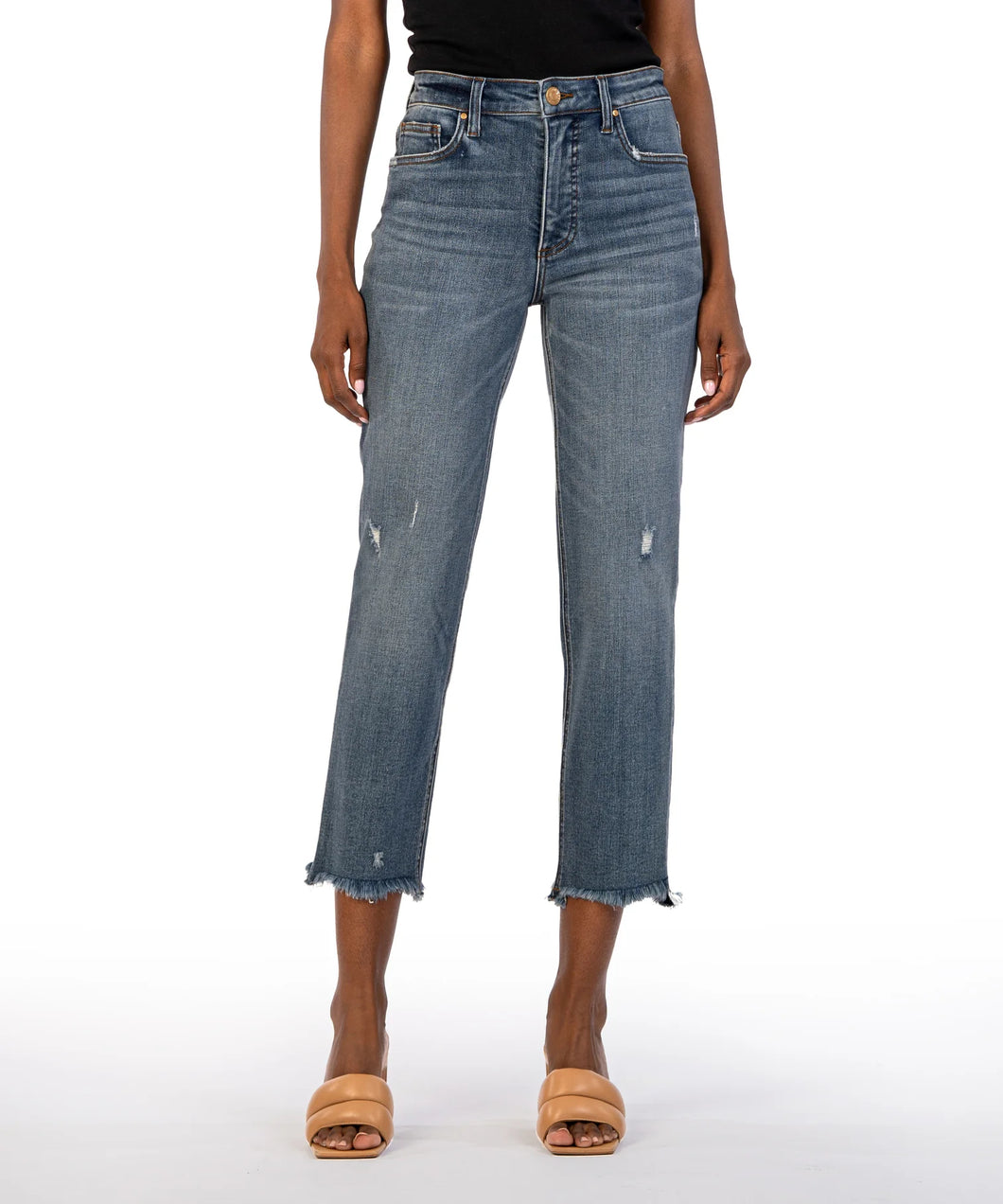 Crafted from comfortable, stretchy denim with subtle distressing, these high-rise jeans are tapered and cropped to replicate the iconic '90s aesthetic. Perfect for any occasion, these jeans offer a versatile wash and timeless style. Color: Built with medium base wash. True to size fit. High rise. Inseam- 26 inch. Perfect stretch. Slight distressing. Frayed hem. Functional front and back pockets.