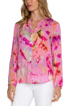 Load image into Gallery viewer, The Fuchsia Watercolor Button Front Shirred Blouse is a stunning addition to any wardrobe, perfect for showcasing contemporary femininity. Its beautiful design features a shirred back, making it a gorgeous statement piece that is sure to garner compliments. For a sophisticated and elevated look, pair it with denim and heels for a night out on the town. For added coverage, pair it with our nude cami.
