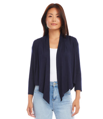 Elevate your style with this versatile cardigan that is perfect for throwing over a dress for a night out or pairing it with your favorite jeans for a casual day. The relaxed silhouette drapes effortlessly, creating a flattering and comfortable fit.